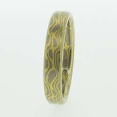 18k white and 18k yellow gold mokume gane flat band.  Please go to online shop for prices.