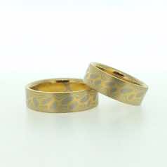 18k white and 22k yellow gold mokume gane flat bands.  Please go to online shop for prices.