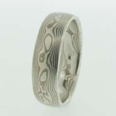 18k white gold and silver mokume gane full court band.  Please go to online shop for prices.