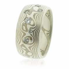 18k white gold and silver mokume gane 12mm full court band with six brilliant cut diamonds in a random scatter.<br/>