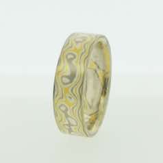 22k gold, 18k white gold and silver mokume gane flat band.  Please go to online shop for prices.