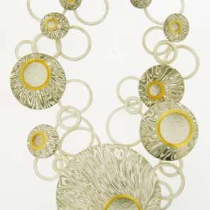 18k white gold and silver mokume gane discus necklace with 22k gold and diamond details.  POA.