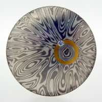 Radiant patterned 18k white gold and silver mokume gane discus brooch with 22k gold halo and diamond detail. 