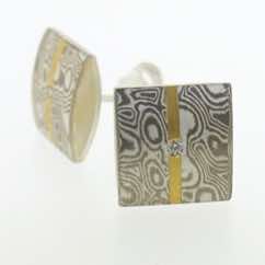 18k white gold and silver convex square studs with 22k gold strip and diamond detail (11mm). 