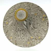 Radiant patterned 18k white gold and silver mokume gane discus brooch (49mmø) with 22k gold rimmed cutaway, 22k gold dots and diamond detail. POA