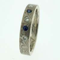 18k white gold and silver mokume gane 3mm flat band with flush set diamonds and blue sapphires