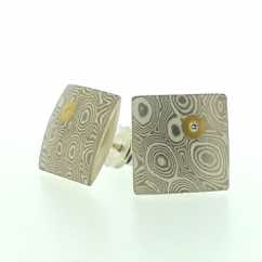 18k white gold and silver square pillow studs with 22k gold and diamond detail (12mm). 