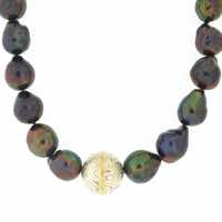 Nucleated peacock pearls with central spherical bead detail in 22k gold, 18k white gold and silver mokume gane with 22k gold and diamond details.  POA.