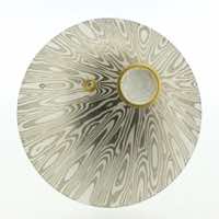 Radiant patterned 18k white gold and silver mokume gane discus brooch (49mmø) with 22k gold rimmed cutaway and diamond detail.