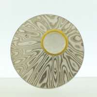 Radiant patterned 18k white gold and silver mokume gane discus brooch (31mmø) with 22k gold rimmed cutaway and diamond detail.