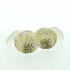 22k gold, 18k white gold and silver mokume gane discus cufflinks.  Sterling silver rod and back.