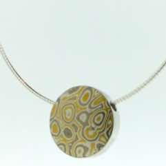 22k gold, 18k white gold and silver mokume gane small discus pendant with diamond detail.  