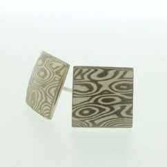18k white gold and silver mokume gane small square pillow stud earrings.