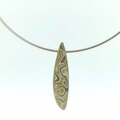 22k gold, 18k white gold and silver mokume gane small Sgiath pendant.  