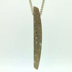 22k gold, 18k white gold and silver mokume gane Sgian pendant with diamond on a 28' sterling silver dovetail chain.  