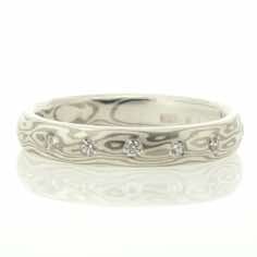 18k white gold and silver mokume gane 3.5mm full court band with five diamonds in a straight line.