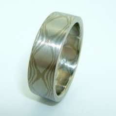 Platinum and 18k white gold mokume gane flat band.  Please go to online shop for prices.